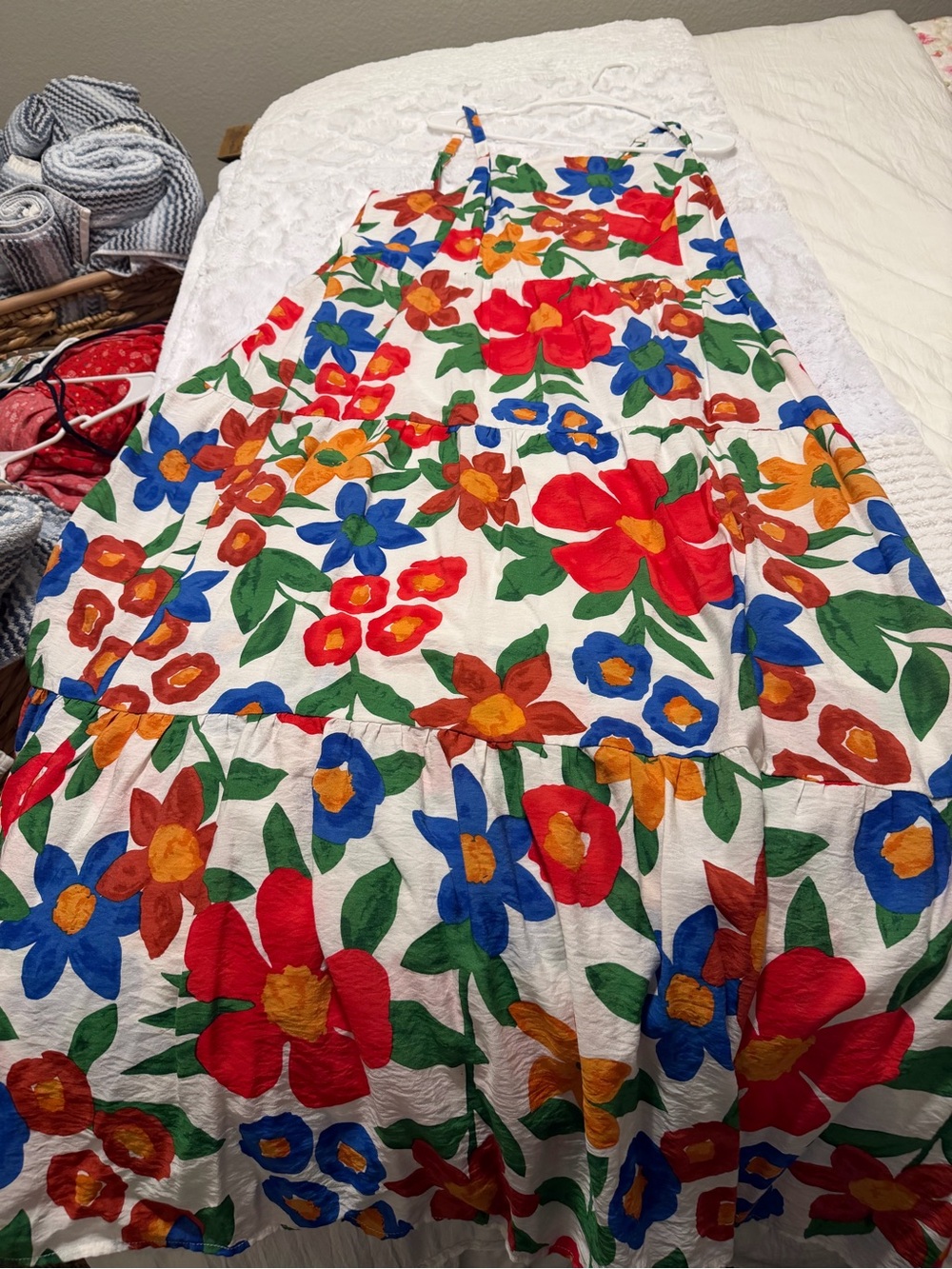 Sleeveless White Maxi Dress with Bold Red, Blue & Orange Floral Print